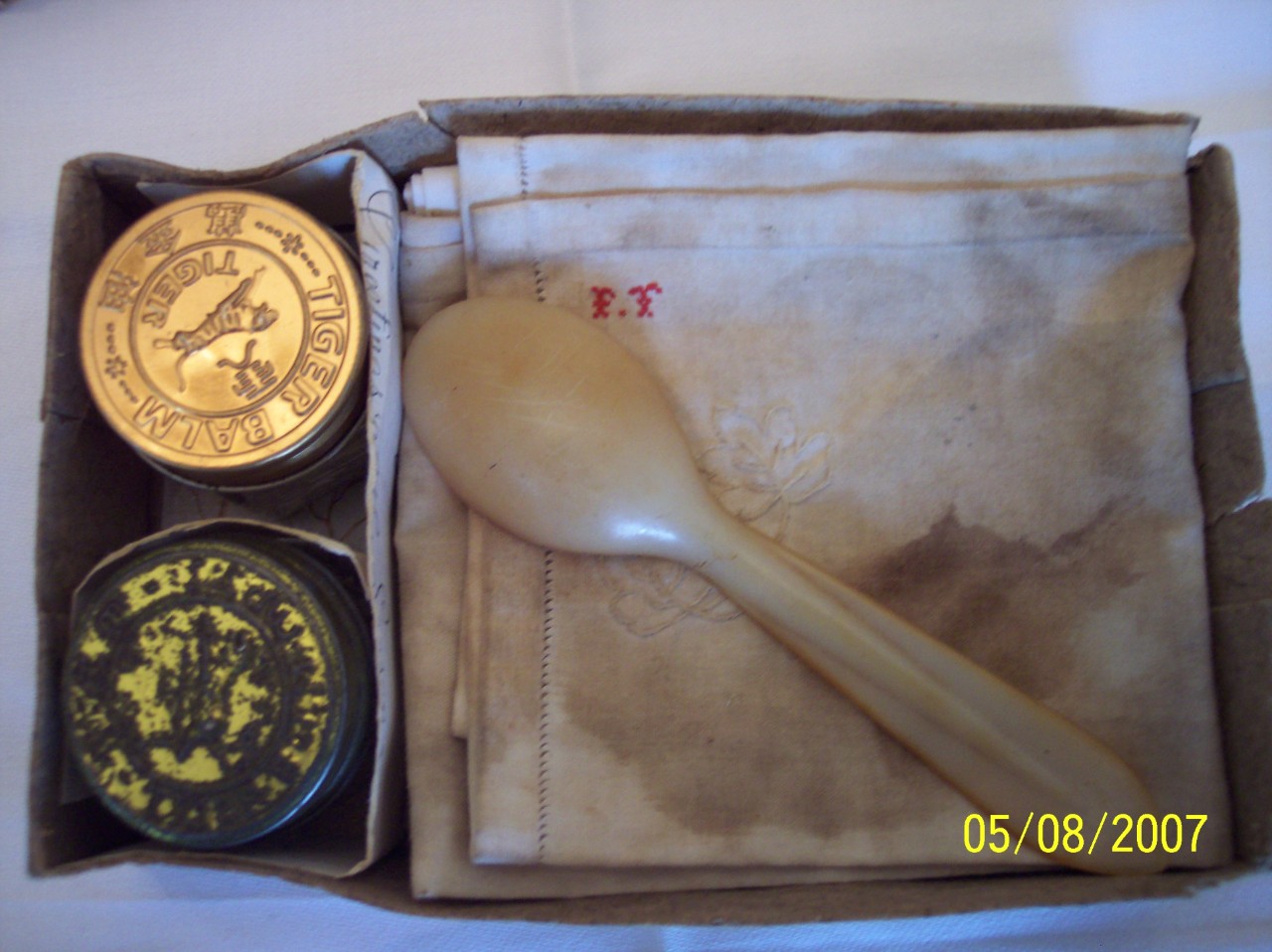 eucharist-wine-containers-cloth-spoon.jpg